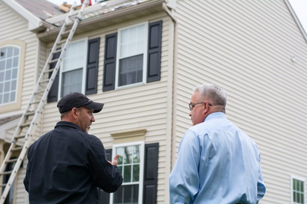 Roofer_Talking_Homeowner2.jpg