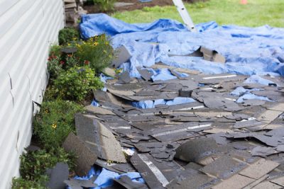 messy flowerbeds from roofing